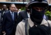 Jean-Claude Duvalier, arrested or taken for questioning, faces Haitian justice